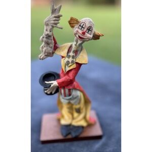 Vintage Clown Magician Pulling A Rabbit From His Hat